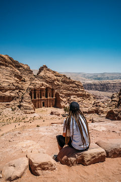 Male Traveler With Dreadlocks Visiting Ruins, Petra, Jordan