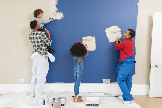 Family painting wall