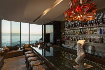 Modern luxury home showcase bar with ocean view