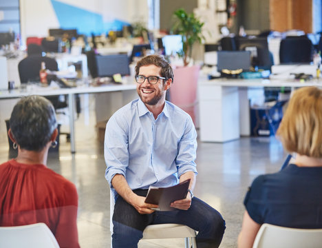 Businessman smiling in meeting