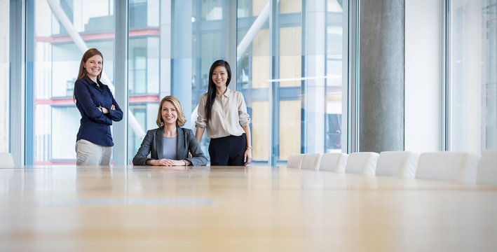 Surface level portrait confident businesswomen in conference room