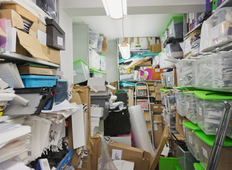 Messy office storage closet