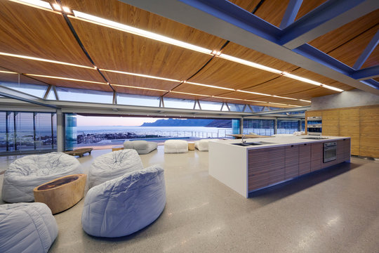 Bean bag chairs in modern luxury hotel space with ocean view