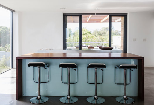 Simple, Modern Home Showcase Interior Kitchen Island With Barstools