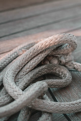 Fototapeta na wymiar Ropes on the deck. Rigging. Sailing marine stuff. 