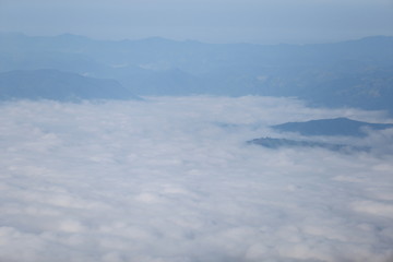 clouds and aerial view of the mountains