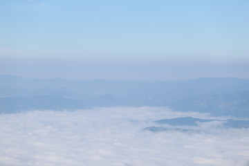 Fototapeta premium clouds and aerial view of the mountains