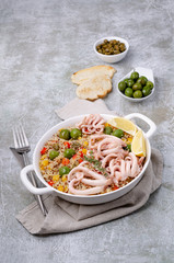 Quinoa with vegetables and squid tentacles