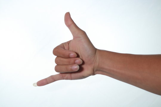 Hand With Thumb Up Isolated On White Background