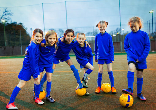 Portrait confident girls soccer team