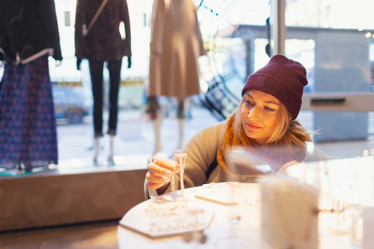 Young Woman Shopping For Jewelry