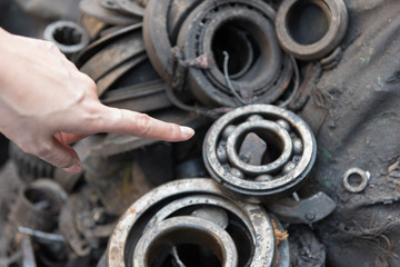 Close-up of old parts, nuts and bolts.