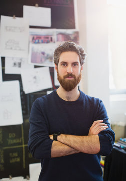 Portrait confident, determined male architect in office