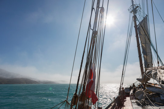 Sailboat rigging on sunny Atlantic Ocean Greenland