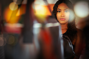Portrait confident young woman boxing