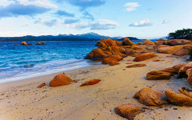 Landscape with Romantic morning at Capriccioli Beach in of the Mediterranean sea on Sardinia island in Italy. Sky with clouds. Porto Cervo and Olbia province. Mixed media.