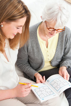 Women doing puzzle