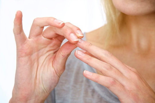 Woman touching her finger