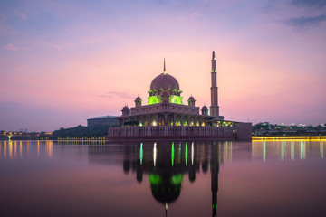 Putrajaya mosque or pink mosque with lake between sunrise in Kuala Lumpur, Malaysia. Malaysia...