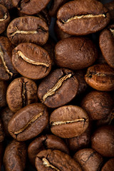 Coffee beans close-up background. Fresh roasted
