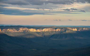 Fototapeta premium Scenery view of Blue Mountains Range landscape in New South Wales state of Australia at sunset. Blue Mountains National Park is one of Australia's most famous wilderness.