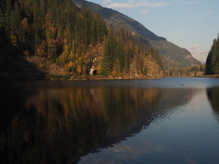 OLYMPUS DIGITAL CAMERA  Clanwilliam Lake with rail tunnel in a back ground at Eagle Pass beside Trans Canada Highway west of Revelstoke British Columbia Canada