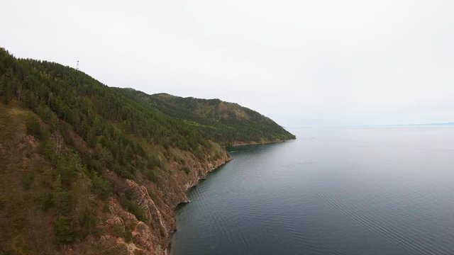Aerial view of lake Baikal. Drone flying over the coast
