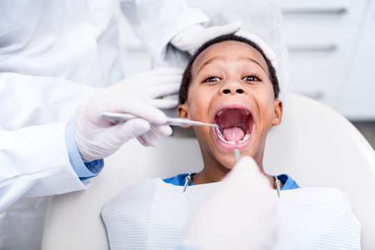 Boy having oral check-up