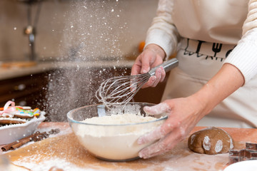 Women prepare cookies in the kitchen concept cooking