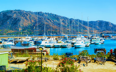 Old Sardinian Port and marina with ships at Mediterranean Sea in city of Villasimius in South...