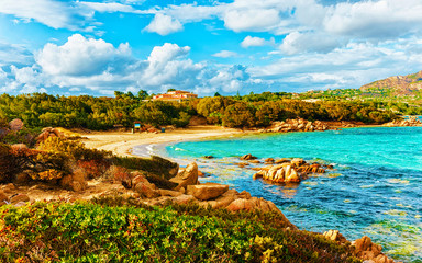 Landscape with Romantic morning at Capriccioli Beach in Costa Smeralda of the Mediterranean sea on Sardinia island in Italy. Sky with clouds. Porto Cervo and Olbia province. Mixed media.