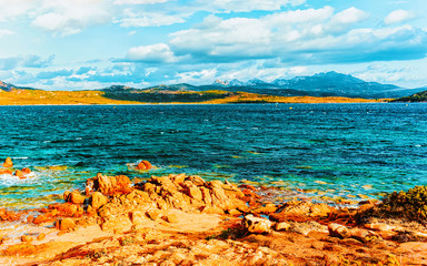 Landscape with Romantic morning at Capriccioli Beach in of the Mediterranean sea on Sardinia island...