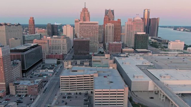 Aerial: Detroit city skyline at sunset. Detroit, Michigan, USA