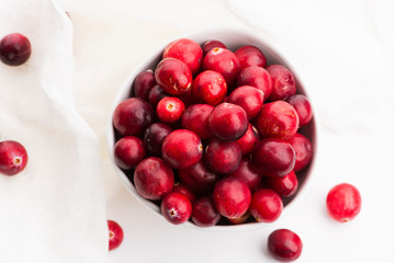Ceramic bowl of Cranberry on white background