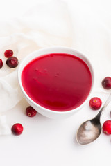 Bowl of Jelly with Cranberry on a white background