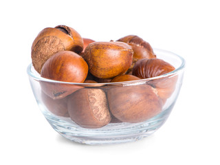 Chestnuts in glass bowl an Isolated on white background