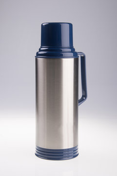 Thermo or Thermo flask from stainless steel on background new.