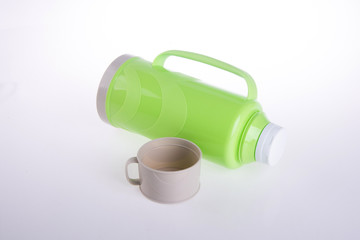 Thermo or Plastic Thermos flask on background new.