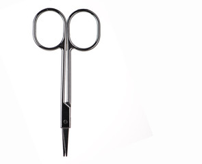 Closed Nail scissors isolated on a white background