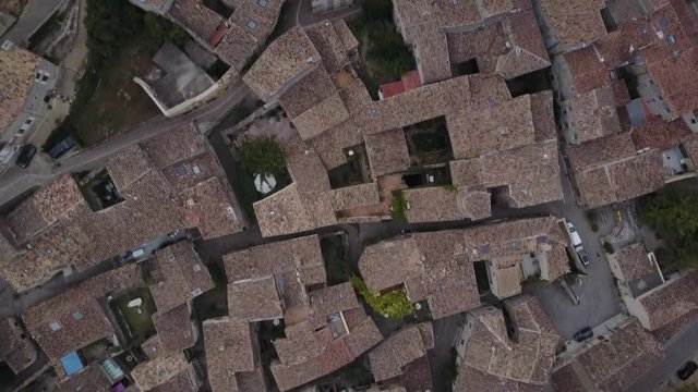 Aerial famous grignan street village in provence at sunrise from above france