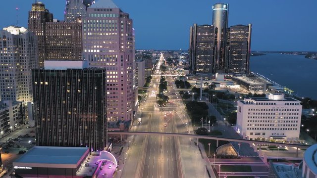 Aerial: Detroit city skyline at night. Detroit, Michigan, USA.