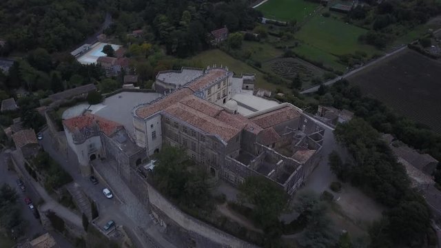 Aerial famous typical Grignan village in provence at sunrise from above france