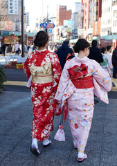 Fototapeta na wymiar Women Wearing Kimono Costume Walking street