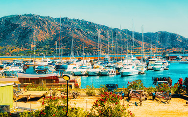 Old Sardinian Port and marina with ships at Mediterranean Sea in city of Villasimius in South...
