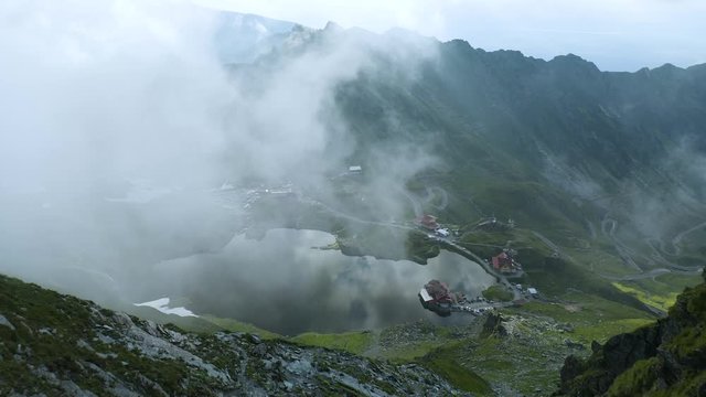 4K Transfagarasan Aerial View Romania Transylvania Men Hiking Climbing Mountain