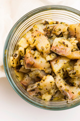 Herring salad with garlic, herbs and olive oil