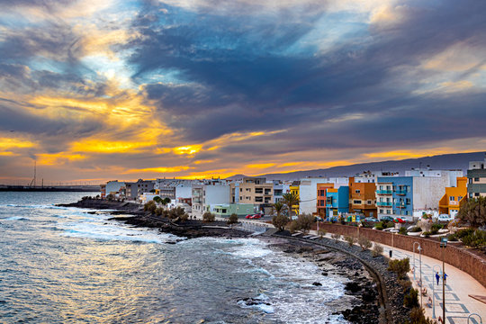 Sunset in small Arinaga town in Spain