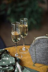 Champagne in champagne flutes on the table in cafe. 
