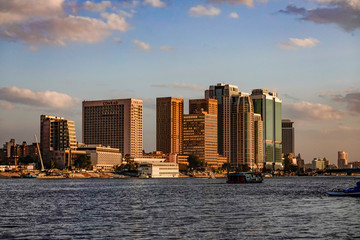 Fototapeta premium Cairo, Egypt, Skyline at sunset and the Nile river.