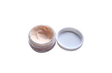 hand cream in a tourist jar. isolated on white background